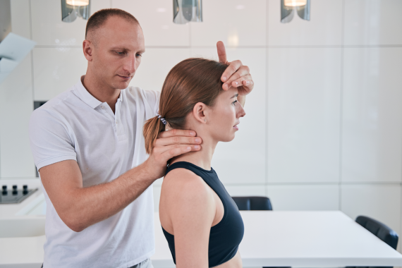 professional-handsome-caucasian-osteopath-examinin-2022-01-18-23-34-50-utc
